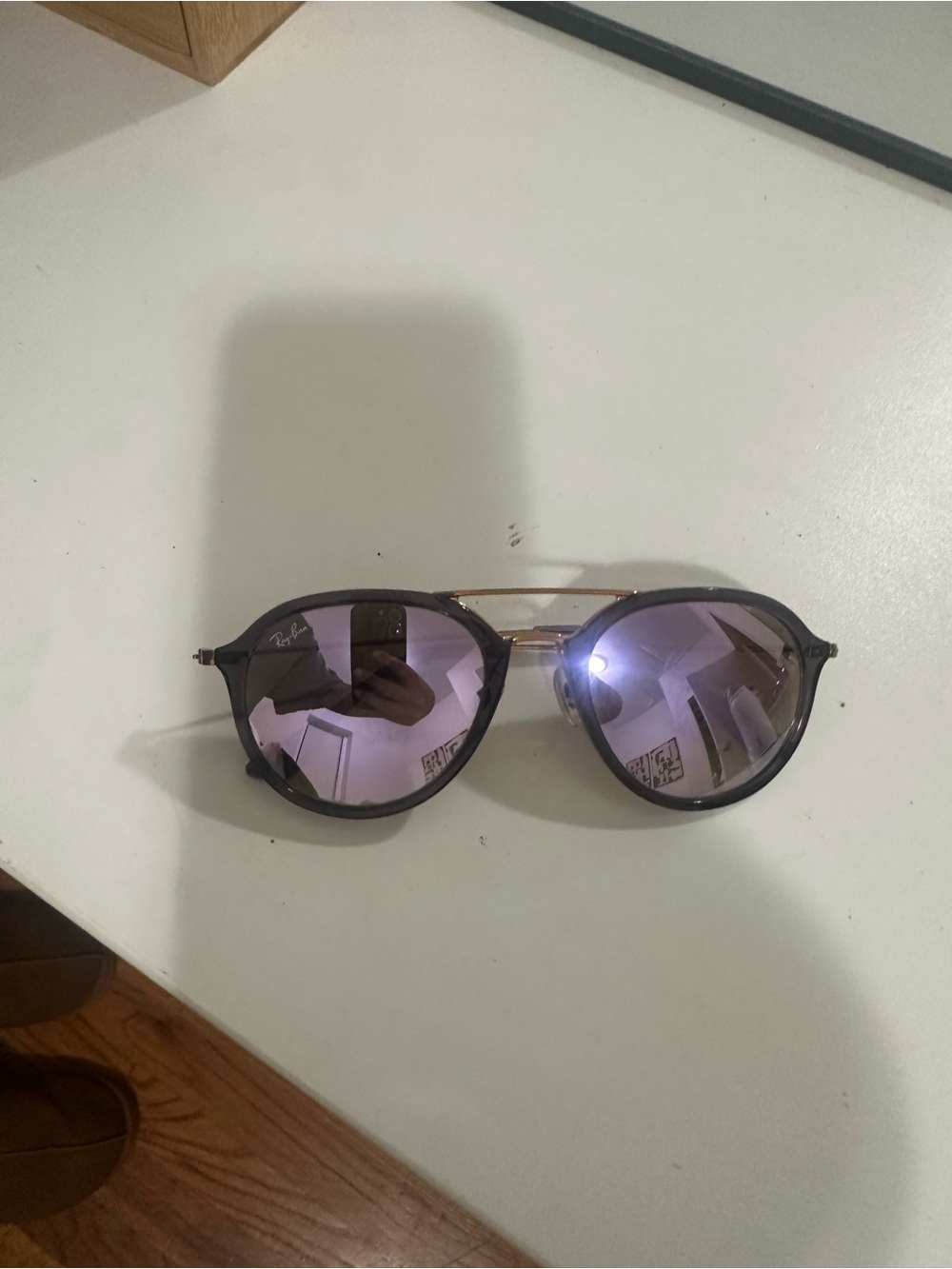 Ray-Ban Black Frame Sunglasses with Purple Mirrored Lenses